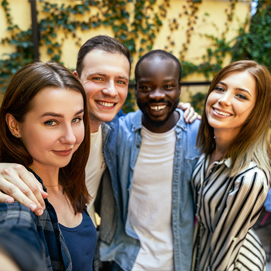 Taking selfie photo with best friends on the warm spring day at the cosy restaurant